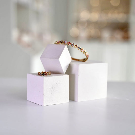 Three white concrete cubes