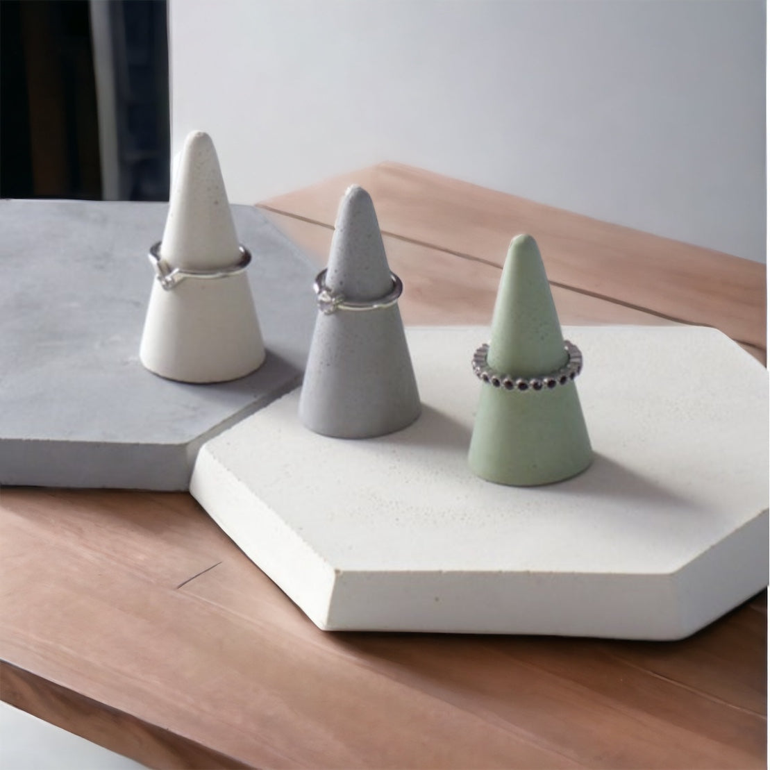 Trio of green, white and gray cones